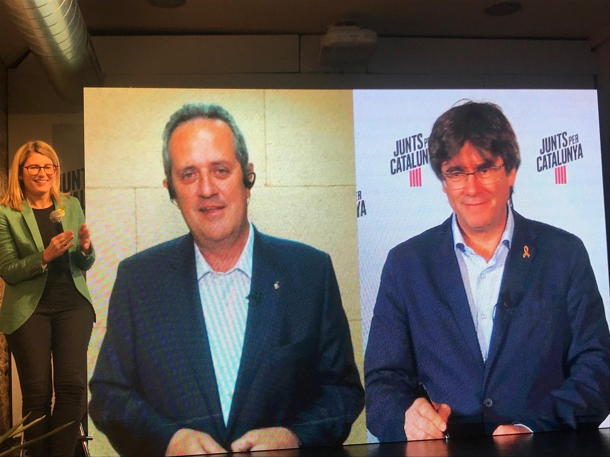 Joaquim Forn, en una connexió en directe des de Soto del Real amb Carles Puigdemont i Elsa Artadi, a la seu electoral de JxCat a Barcelona / Europa Press