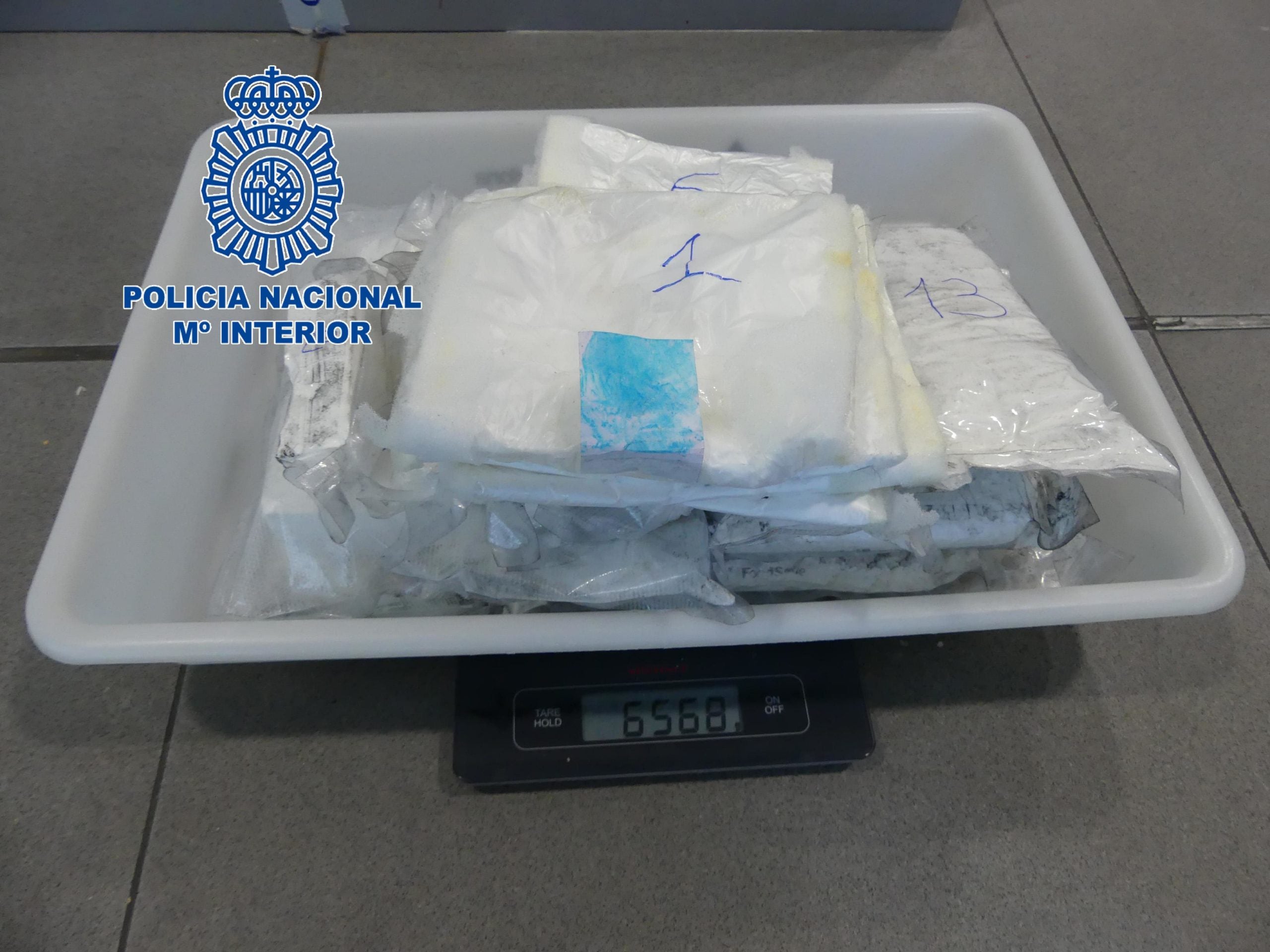 Cocaïna localitzada al doble fons d'una maleta | Policia Nacional