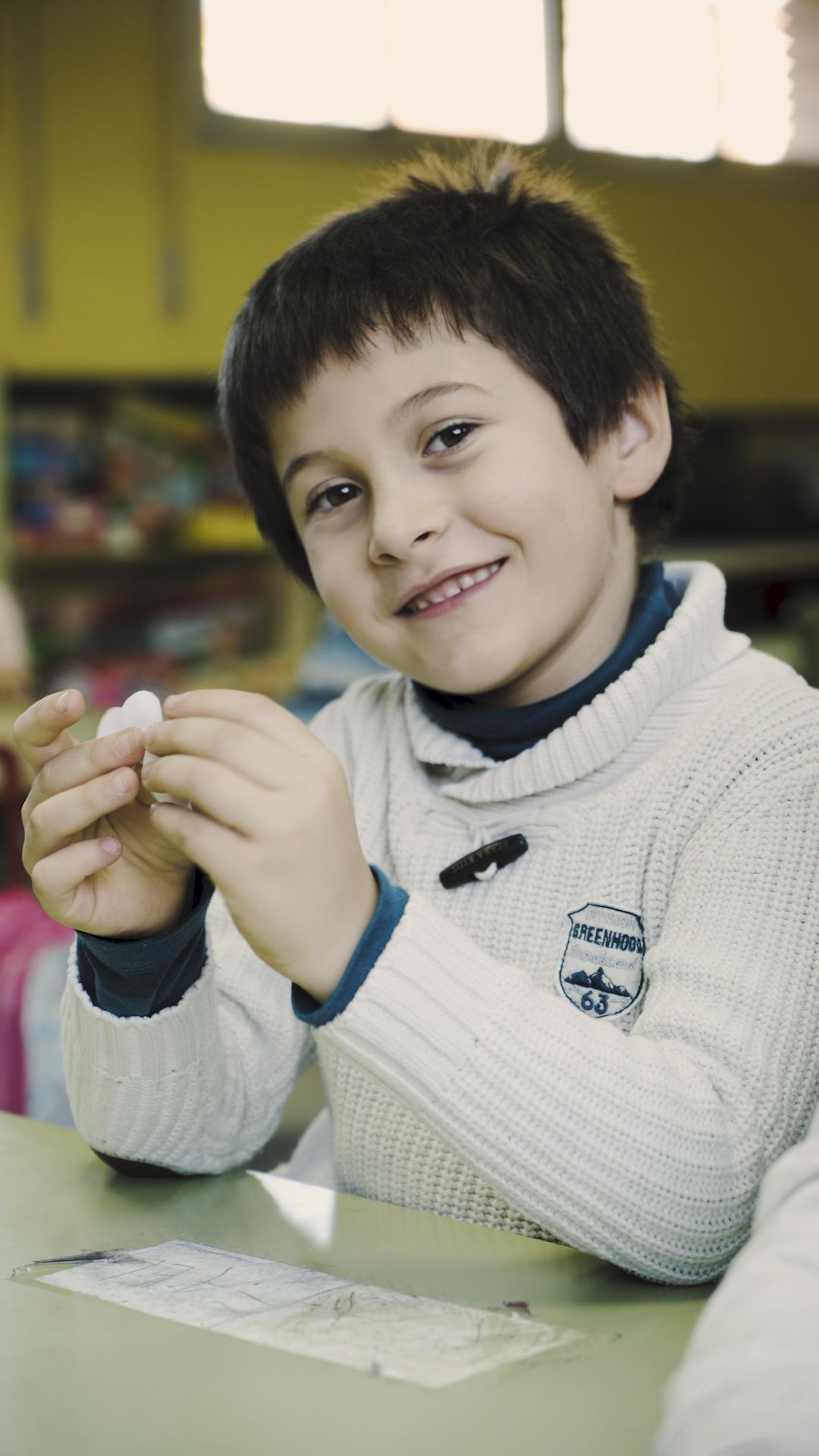 Nens en una escola de primària, per al projecte Alma de l'Obra Social 