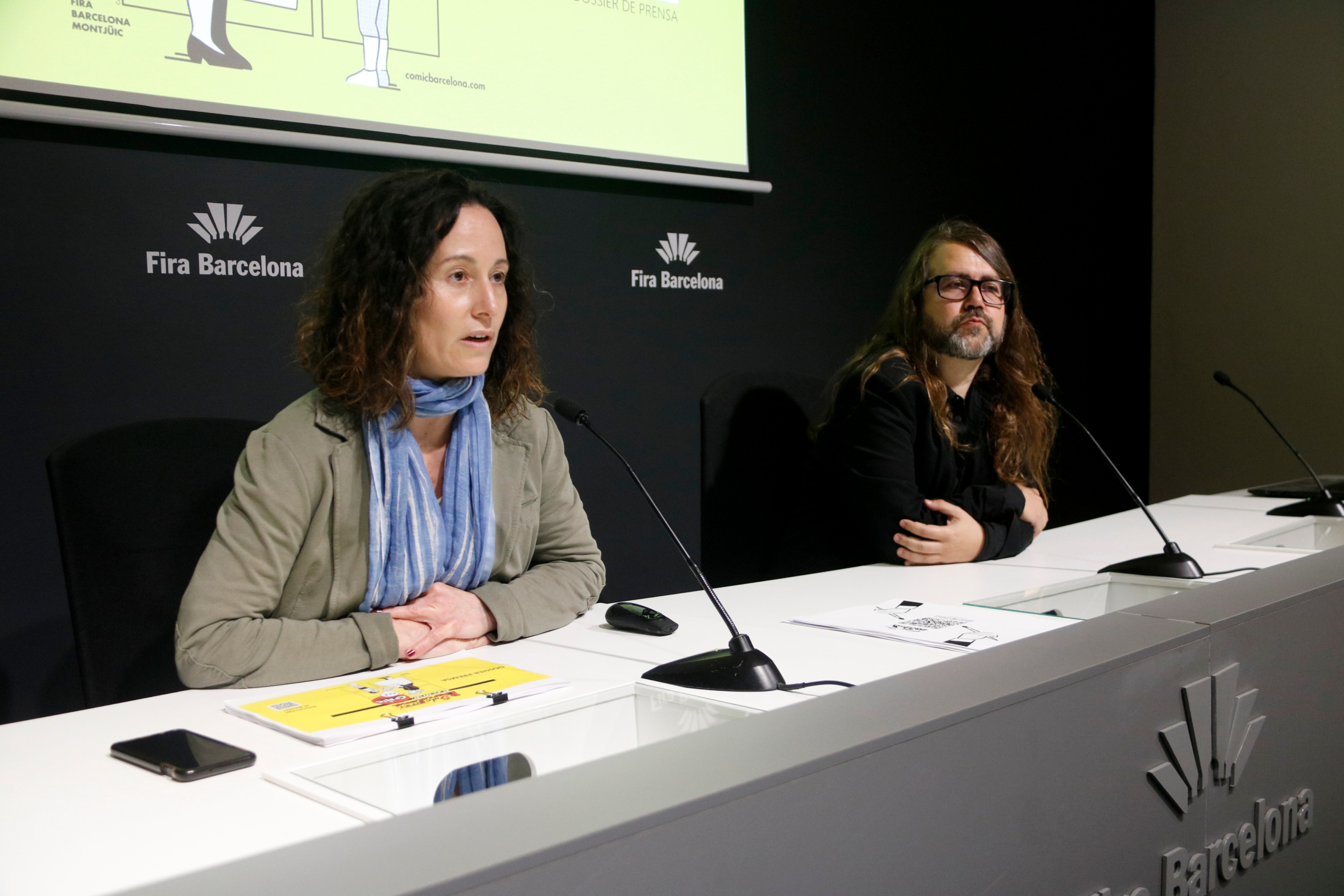 Meritxell Puig, directora general de Ficom, organitzadora del Comic Barcelona, el saló del còmic, i l'assessor de continguts Borja Crespo / ACN